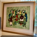 A04. Framed African batik artwork signed Matoui. 22”h x 24”w 